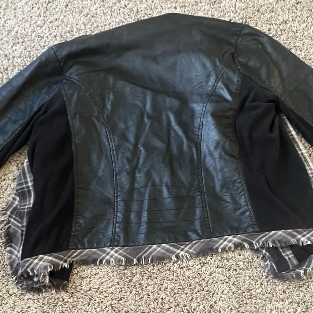 Brand new size large leather Buckle jacket.